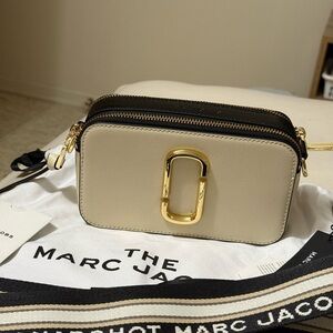 ❌S O L D❌Marc Jacobs Cream and Black Crossbody Bag with Gold Accents